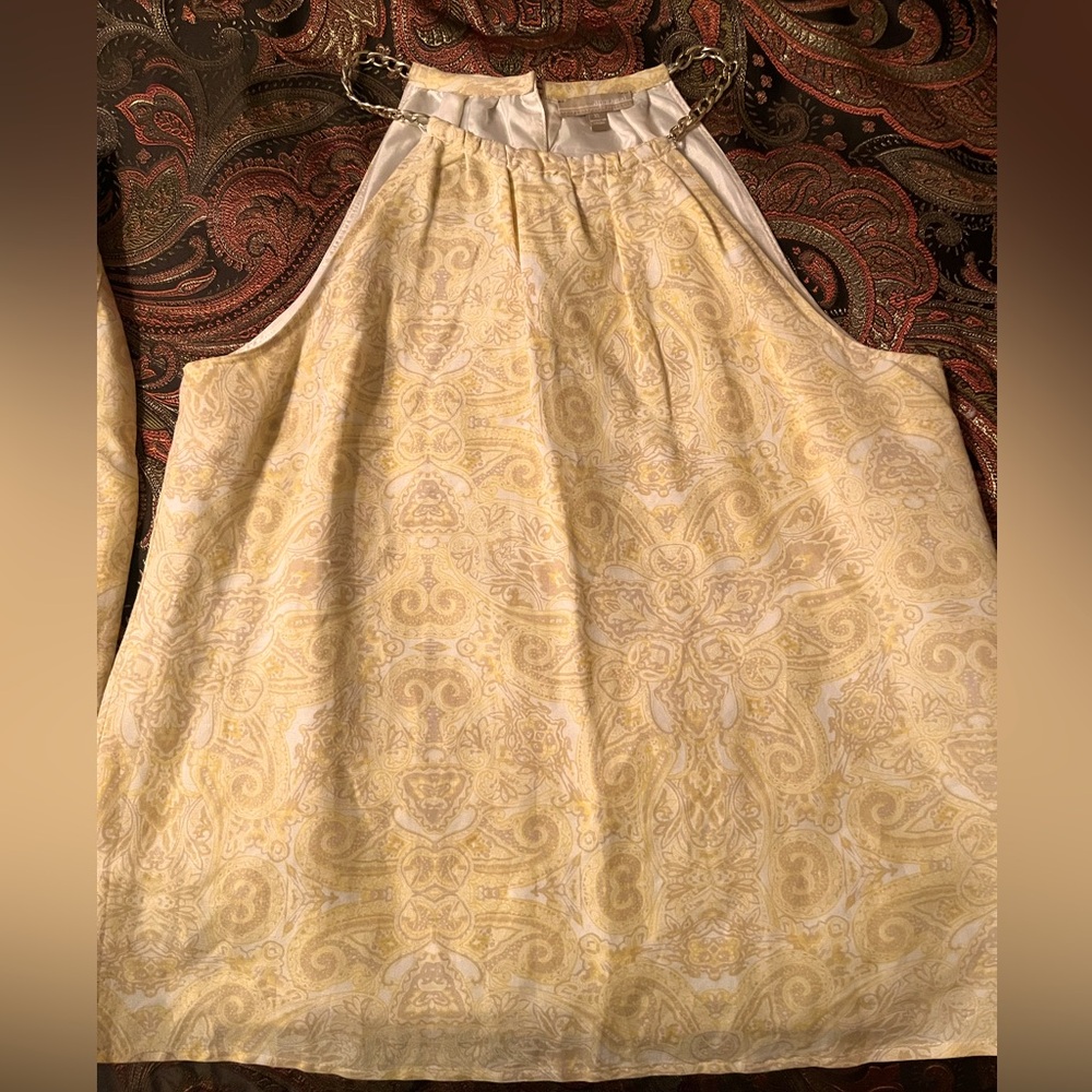 Elegance, halter, and faux wrap skirt suit